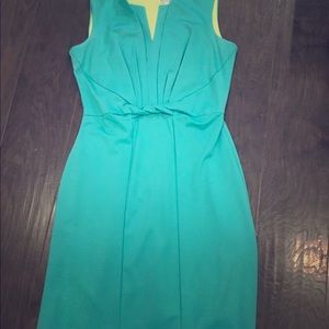 Gorgeous turquoise knot front detail back zip midi dress